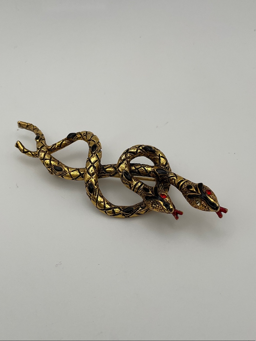 Vintage mythological double snake brooch by ART